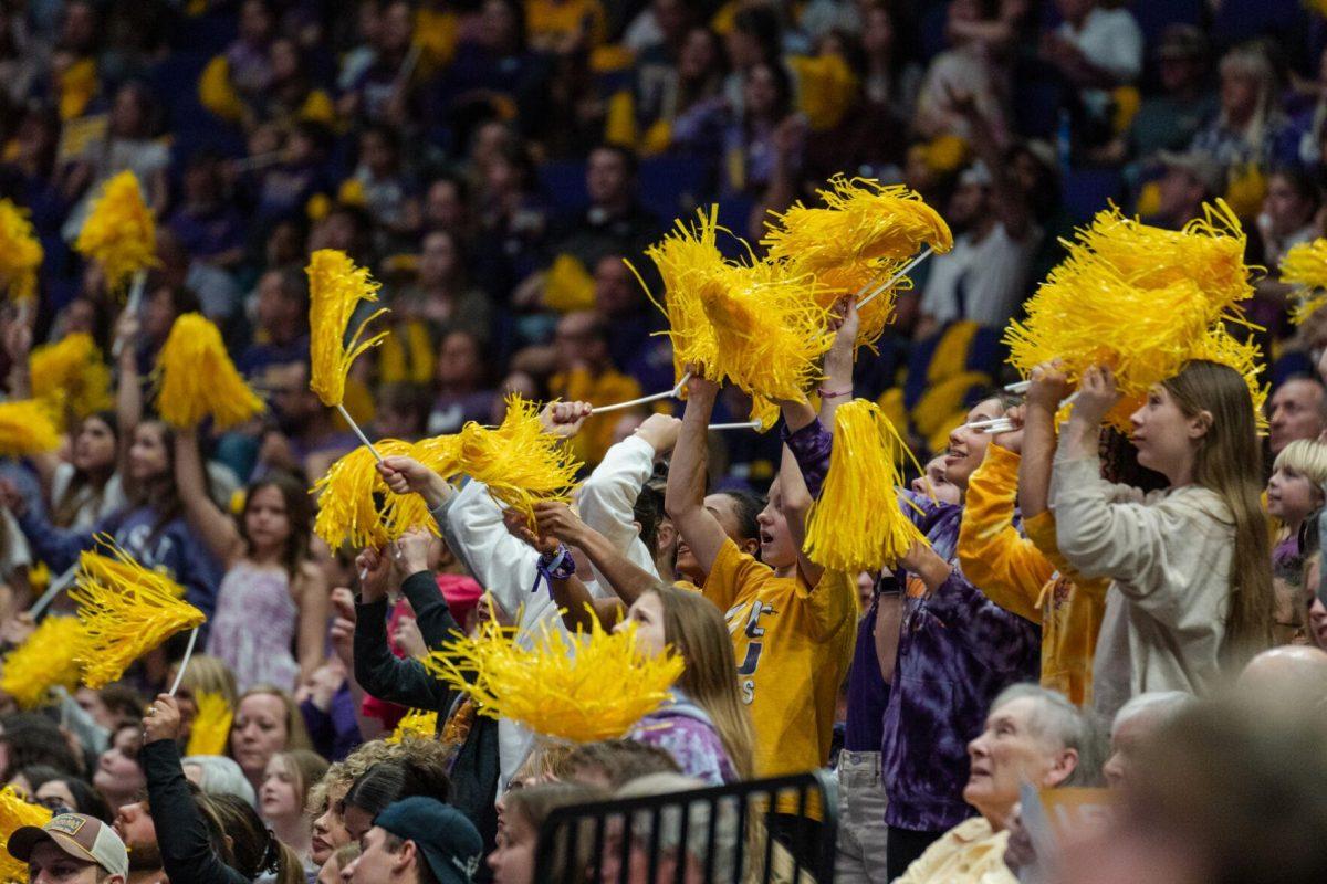 LSU fans cheer for the gymnasts on Friday, March 4, 2022, during LSU gymnastics&#8217; 107.500-197.450 loss against Kentucky in the Pete Maravich Assembly Center on North Stadium Drive in Baton Rouge, La.