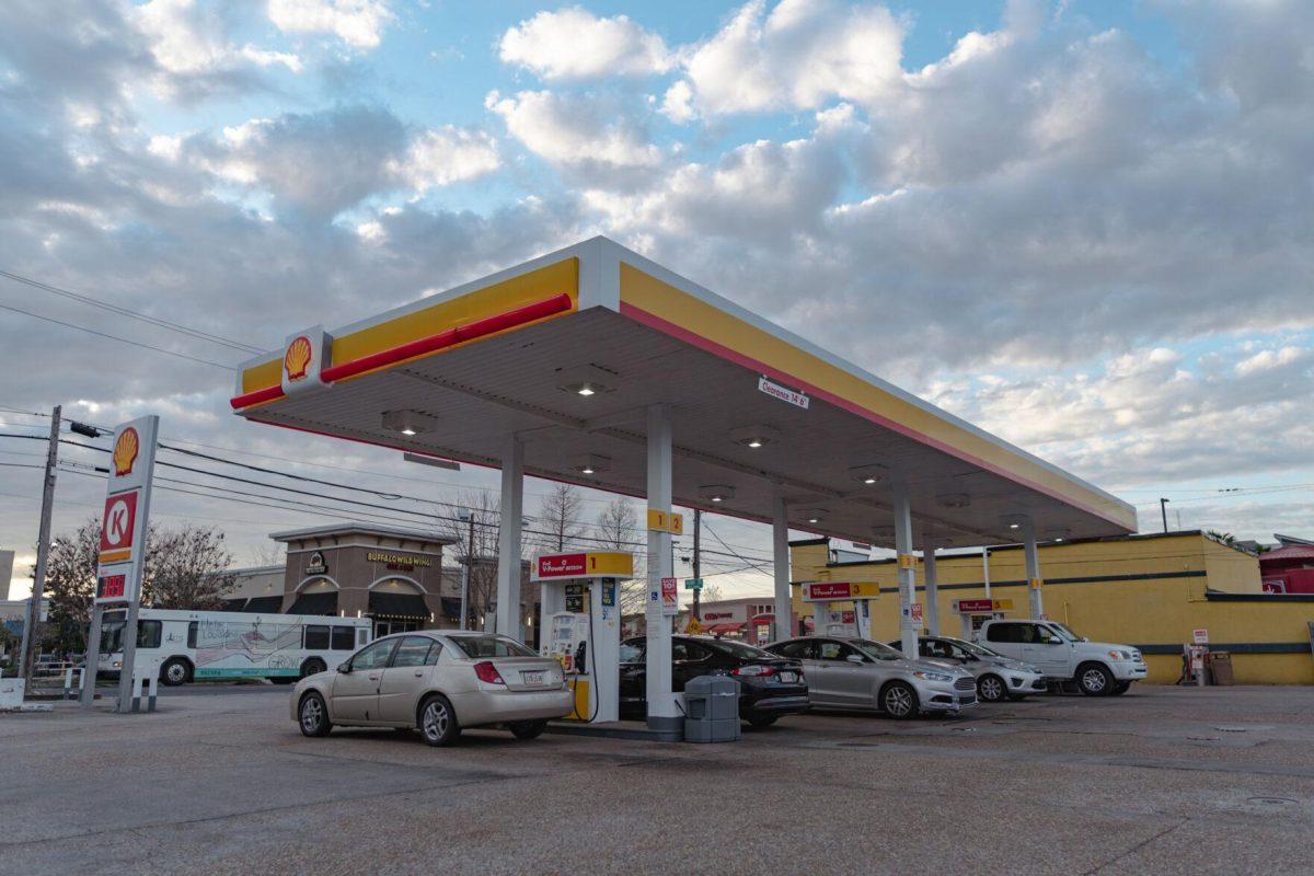 People fill up their fuel tanks on Monday, March 7, 2022, at a Shell station on Highland Road in Baton Rouge, La.