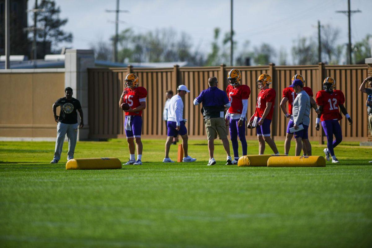 LSU head coach Brian Kelly speaks to the quarterbacks Tuesday, March 29, 2022 during LSU's spring practice in Baton Rouge, La.