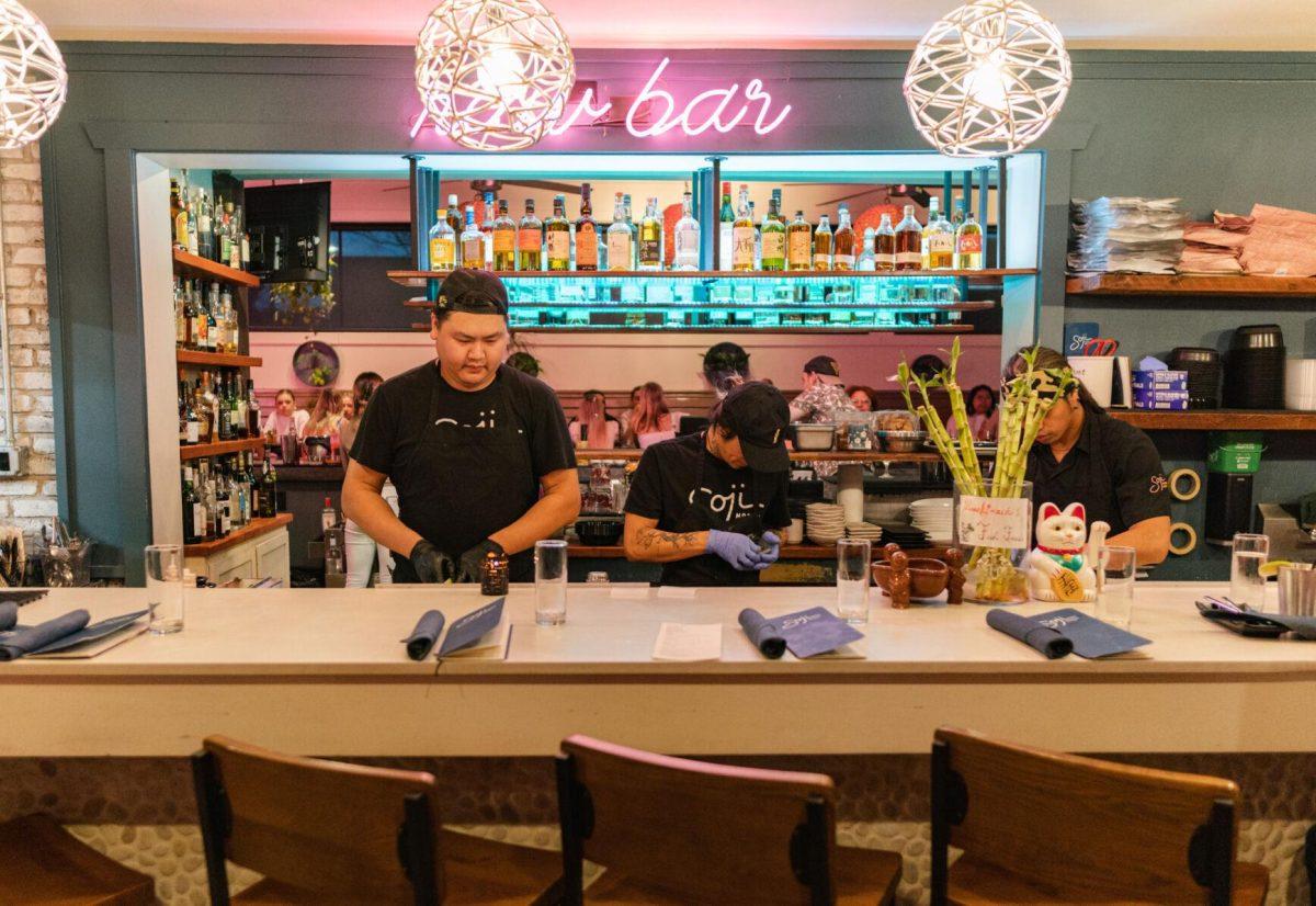 Three chefs prepare food on Saturday, March 5, 2022, at Soji Modern Asian on Government Street in Baton Rouge, La.