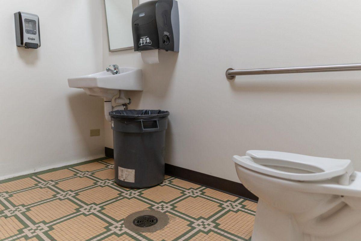 A drain sits in the center of the floor on Tuesday, March 29, 2022, inside an Allen Hall bathroom on LSU&#8217;s campus in Baton Rouge, La.