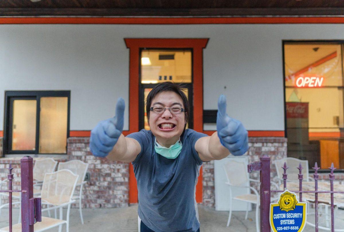 Charlie smiles in front of the restaurant on Tuesday, March 8, 2022, at Charlie&#8217;s Kitchen on West Chimes Street in Baton Rouge, La.