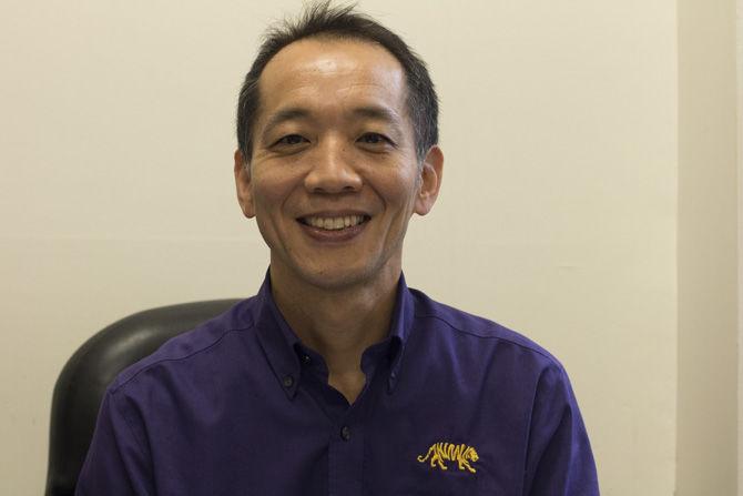 Department of Biological Sciences associate professor Naohiro Kato sits in his office on Monday, Feb. 12, 2018.