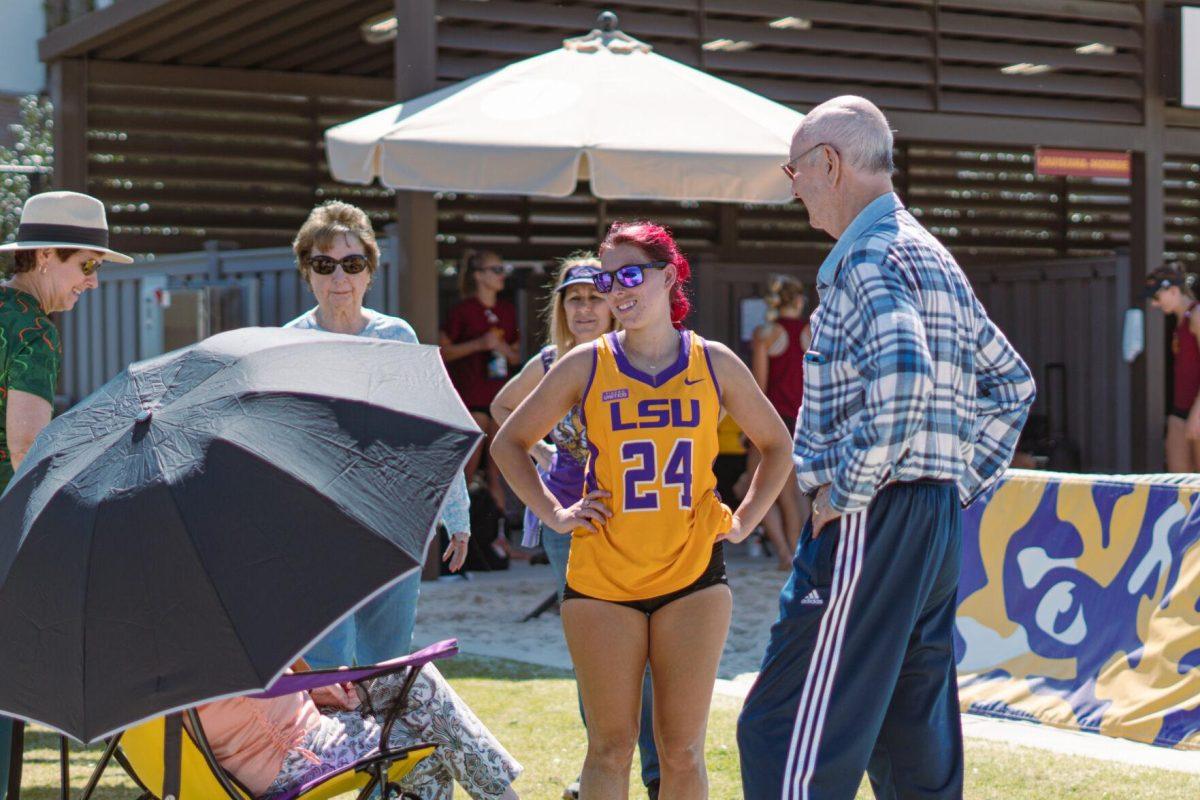 LSU beach volleyball Senior Alexis Toney (24) talks with family after her match on Sunday, March 27, 2022, during LSU&#8217;s 1-4 loss against TCU at the Beach Volleyball Stadium on Cypress Drive in Baton Rouge, La.