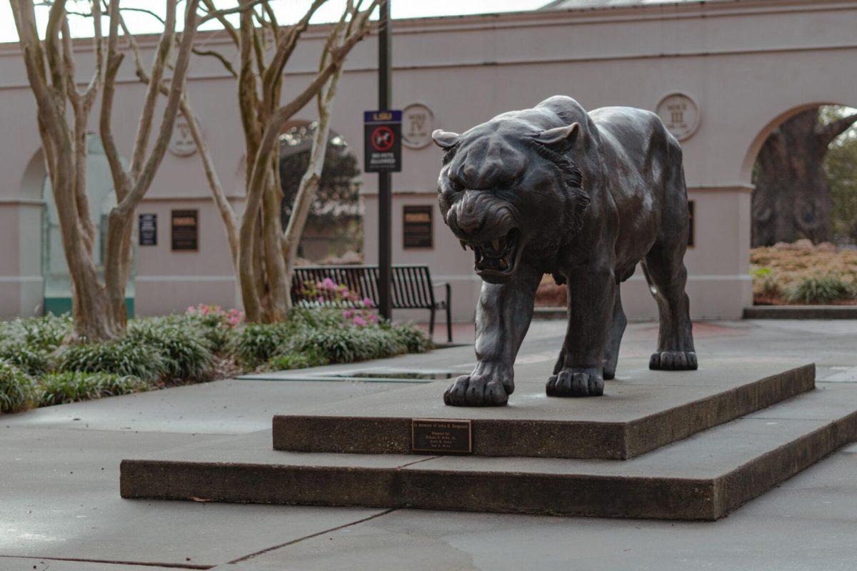 A statue of Mike the Tiger roars on Tuesday, March 22, 2022, on North Stadium Drive in Baton Rouge, La.