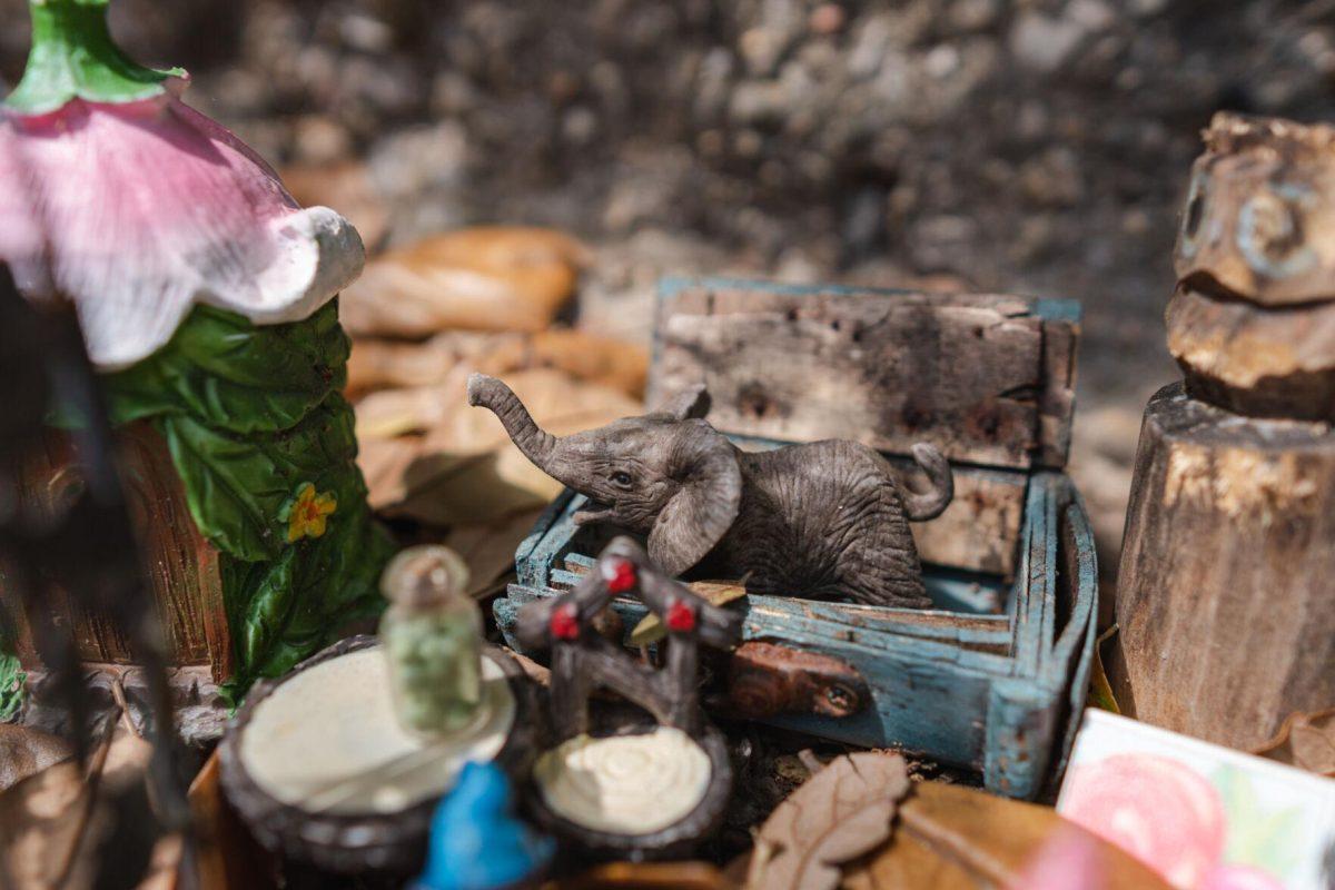 The resident elephant toots its trunk on Thursday, March 24, 2022, in the Fairy Garden on LSU&#8217;s campus in Baton Rouge, La.