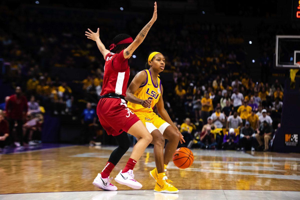 LSU women&#8217;s basketball graduate student guard Khayla Pointer (3) attempts to get past an Alabama defender Thursday, Feb. 24, 2022, after LSU&#8217;s Senior Night 58-50 win against Alabama in the Pete Maravich Assembly Center on North Stadium Drive in Baton Rouge, La.