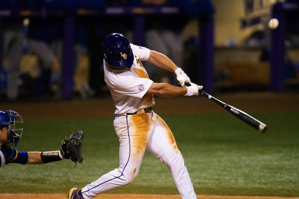 LSU baseball redshirt junior infielder Gavin Dugas (8) hits the ball Wednesday, March 9, 2022 before LSU's 6-3 win against McNeese at Alex Box Stadium on Gourrier Avenue in Baton Rouge, La.