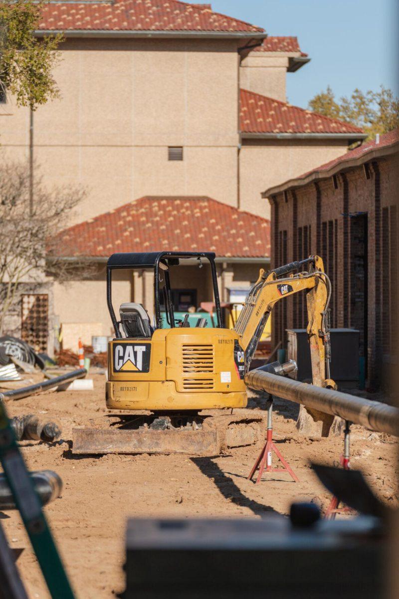 Construction equipment sits near the buildings under renovation on Sunday, March 20, 2022, at the LSU Studio Arts Buildings on South Campus Drive in Baton Rouge, La.