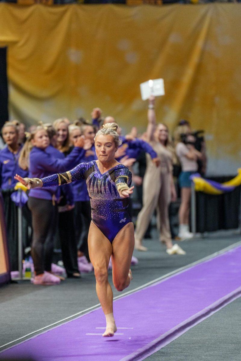 LSU gymnastics all-around freshman Alexis Jeffrey races down the runway on Friday, March 4, 2022, during LSU gymnastics&#8217; 107.500-197.450 loss against Kentucky in the Pete Maravich Assembly Center on North Stadium Drive in Baton Rouge, La.