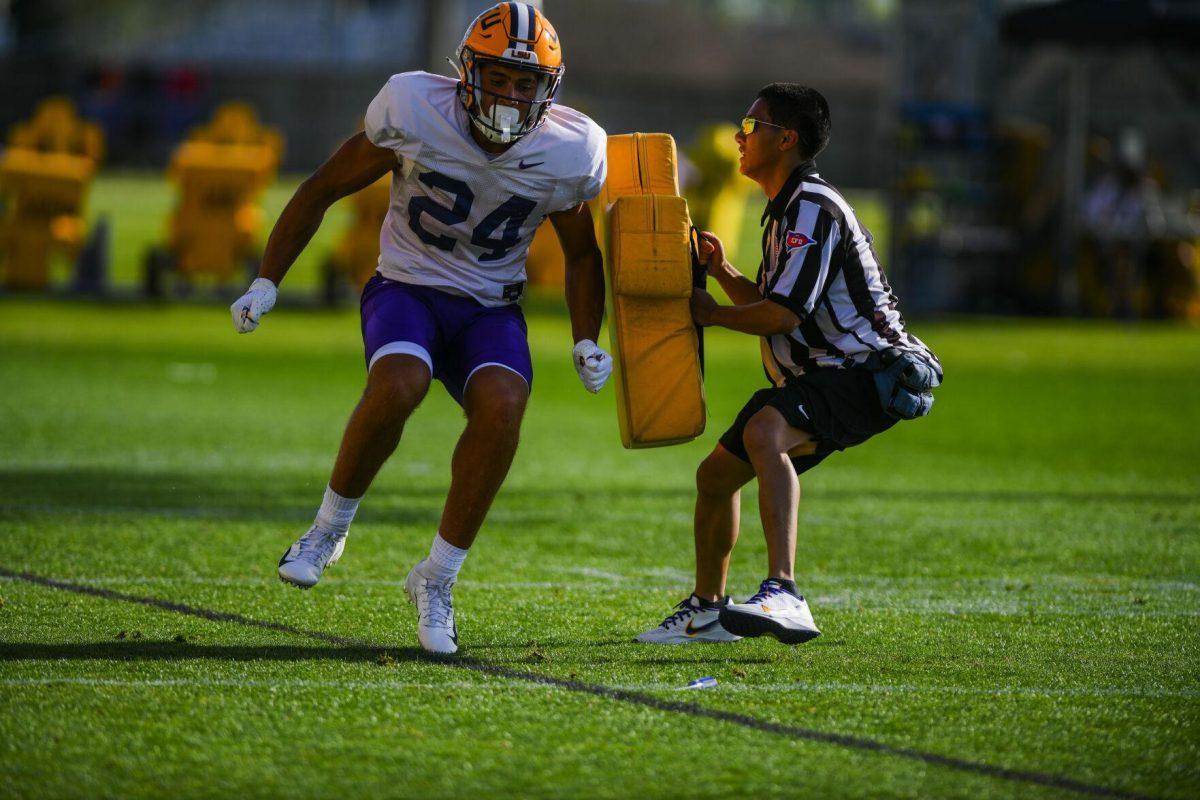 LSU football wide receiver Eric Gibson (24) runs through a drill Tuesday, March 29, 2022 during LSU's spring practice in Baton Rouge, La.