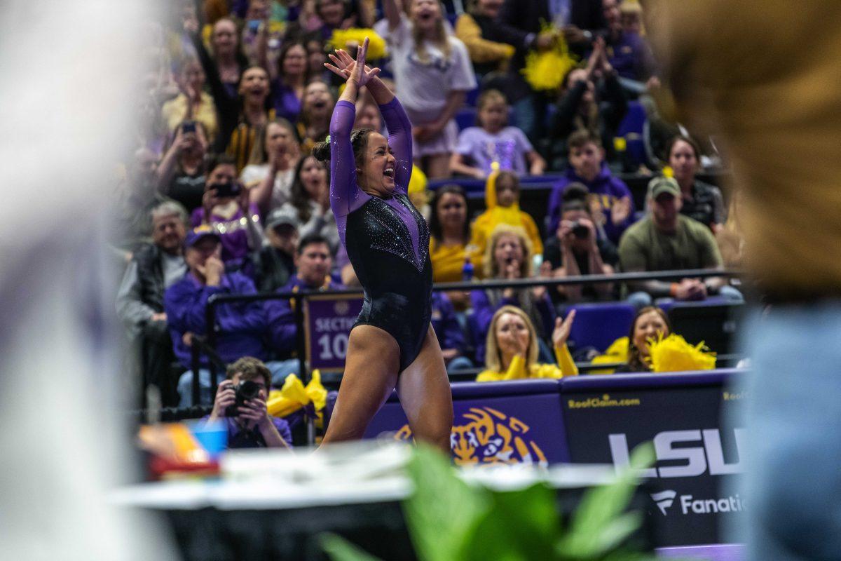 <p>LSU gymnastics all-round freshmen Aleah Finnegan celebrates after completing her 9.925 floor routine Friday, March 11, 2022 during LSU's 198.125-197.875 win over University of Utah in the Pete Maravich Assembly Center on N. Stadium Drive in Baton Rouge, La.</p>