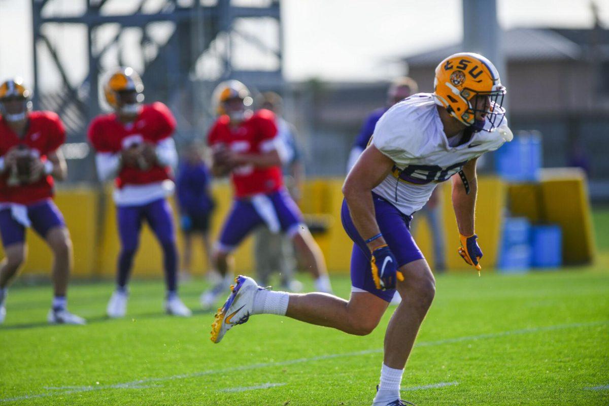 LSU football sophomore wide receiver Jack Bech (80) runs through the play Tuesday, March 29, 2022 during LSU's spring practice in Baton Rouge, La.