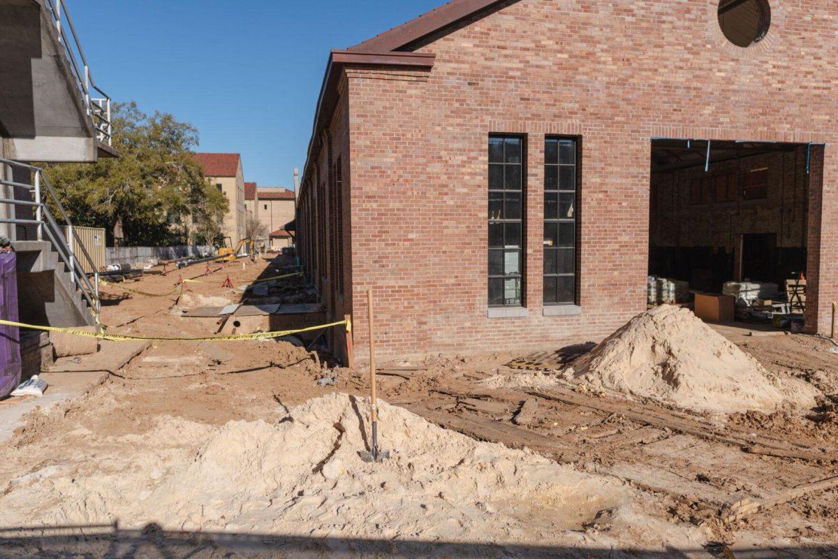 A shovel stands in the sand on Sunday, March 20, 2022, as renovations occur at the LSU Studio Arts Buildings on South Campus Drive in Baton Rouge, La.