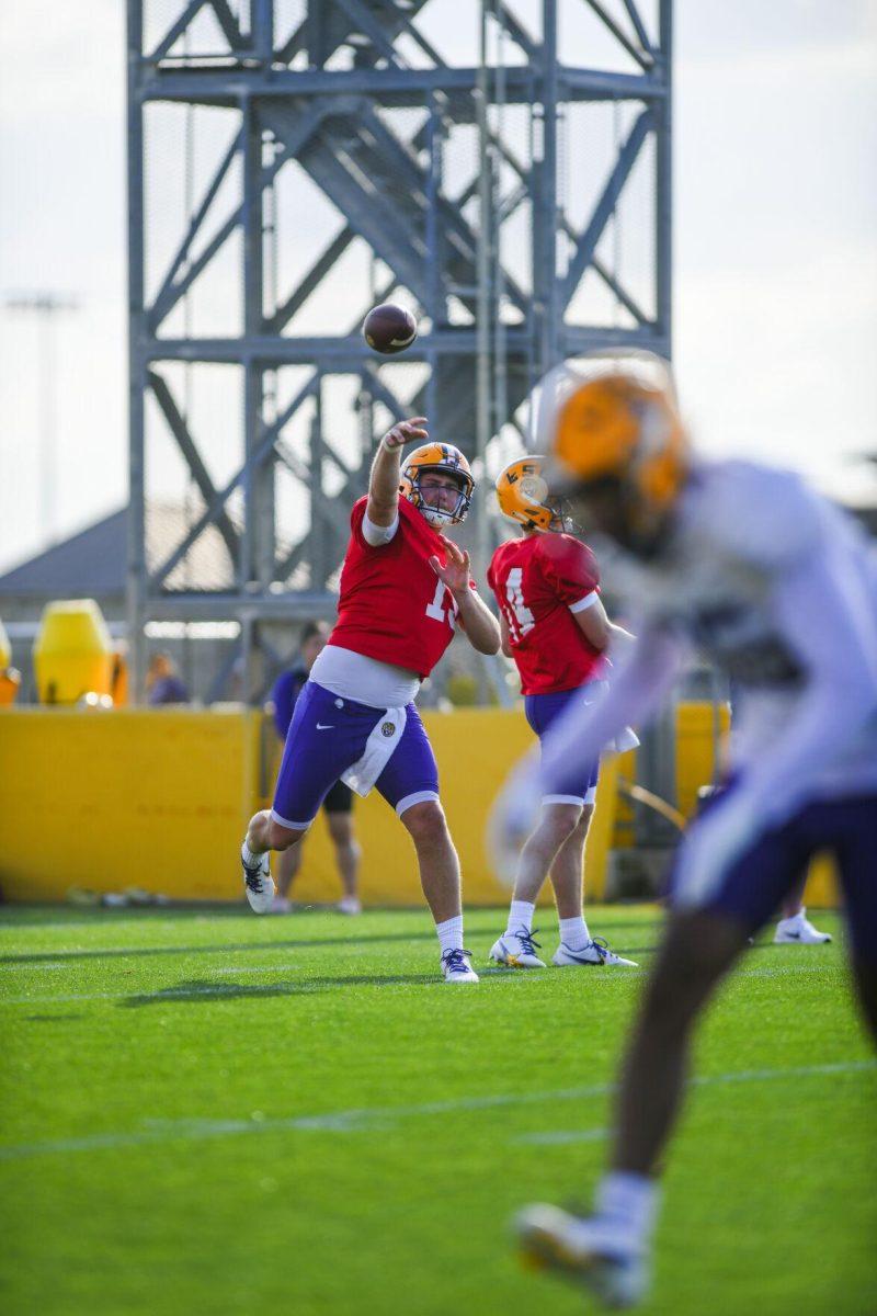 LSU football 5th year senior quarterback Myles Brennan (15) throws the ball Tuesday, March 29, 2022 during LSU's spring practice in Baton Rouge, La.