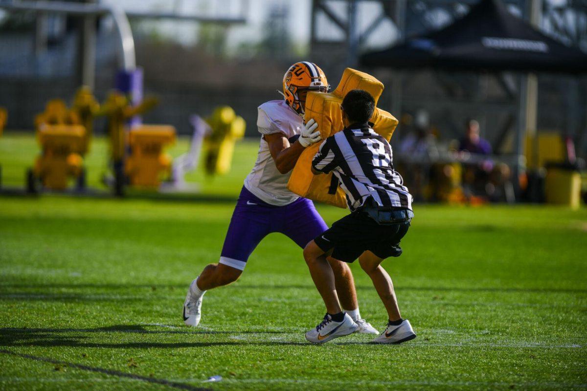 LSU football wide receiver Eric Gibson (24) runs through a drill Tuesday, March 29, 2022 during LSU's spring practice in Baton Rouge, La.