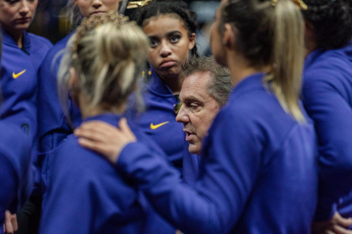 LSU gymnastics Head Coach Jay Clark speaks to the team on Friday, March 4, 2022, after LSU gymnastics&#8217; 107.500-197.450 loss against Kentucky in the Pete Maravich Assembly Center on North Stadium Drive in Baton Rouge, La.