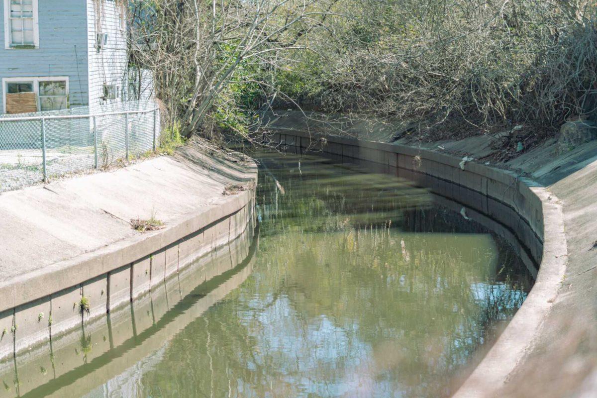 The Corporation Canal flows on Thursday, March 10, 2022, near East State Street in Baton Rouge, La.