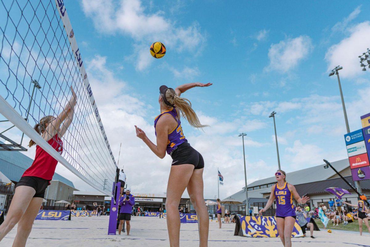 LSU beach volleyball redshirt sophomore Sierra Caffo (35) swings for the ball on Sunday, March 6, 2022, during LSU&#8217;s 3-2 win over Loyola Marymount at the Beach Volleyball Stadium on Cypress Drive in Baton Rouge, La.