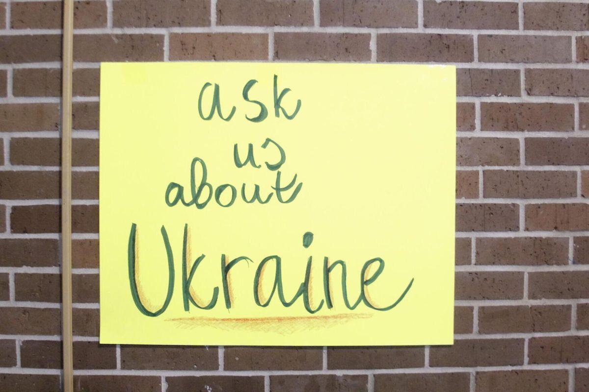 A sign that says "Ask us about Ukraine" sits on the wall Friday, March 4, 2022 at the for the Ukraine supoort event at the LSU International Cultural Center on Dalrymple Drive in Baton Rouge, La.