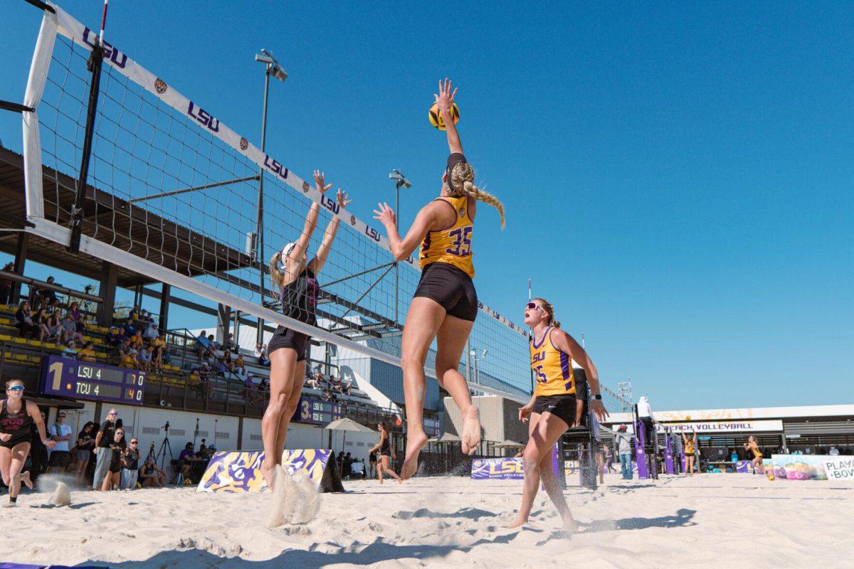 LSU beach volleyball redshirt sophomore Sierra Caffo (35) taps the ball with one hand on Sunday, March 27, 2022, during LSU&#8217;s 1-4 loss against TCU at the Beach Volleyball Stadium on Cypress Drive in Baton Rouge, La.