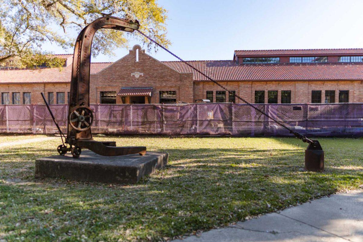 A sculpture sits in front of the fenced-off construction area on Sunday, March 20, 2022, at the LSU Studio Arts Buildings on South Campus Drive in Baton Rouge, La.