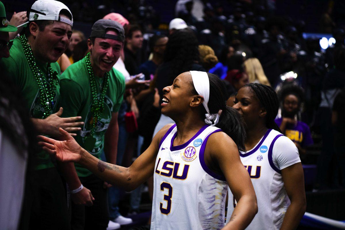 LSU women&#8217;s basketball graduate student guard Khayla Pointer (3) celebrates with members of the Balcony Bengals Saturday, March 19, 2022, after LSU&#8217;s 83-77 win against Jackson State in the first round of the NCAA women&#8217;s basketball tournament in the Pete Maravich Assembly Center on North Stadium Drive in Baton Rouge, La.