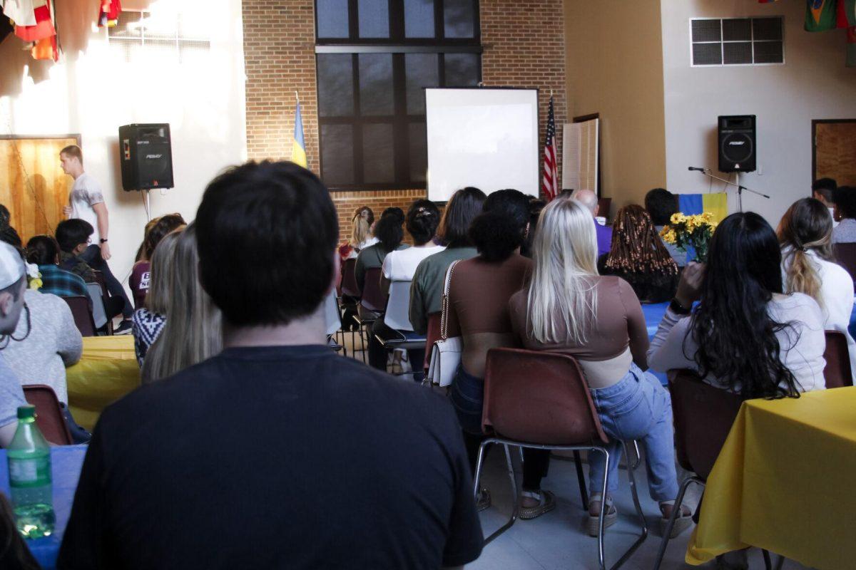 The crowd watches a video Friday, March 4, 2022 at the for the Ukraine supoort event at the LSU International Cultural Center on Dalrymple Drive in Baton Rouge, La.