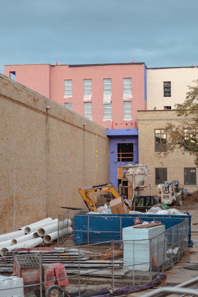 Construction equipment sits alongside the building on Tuesday, March 22, 2022, at the Huey P. Long Field House on Field House Drive in Baton Rouge, La.