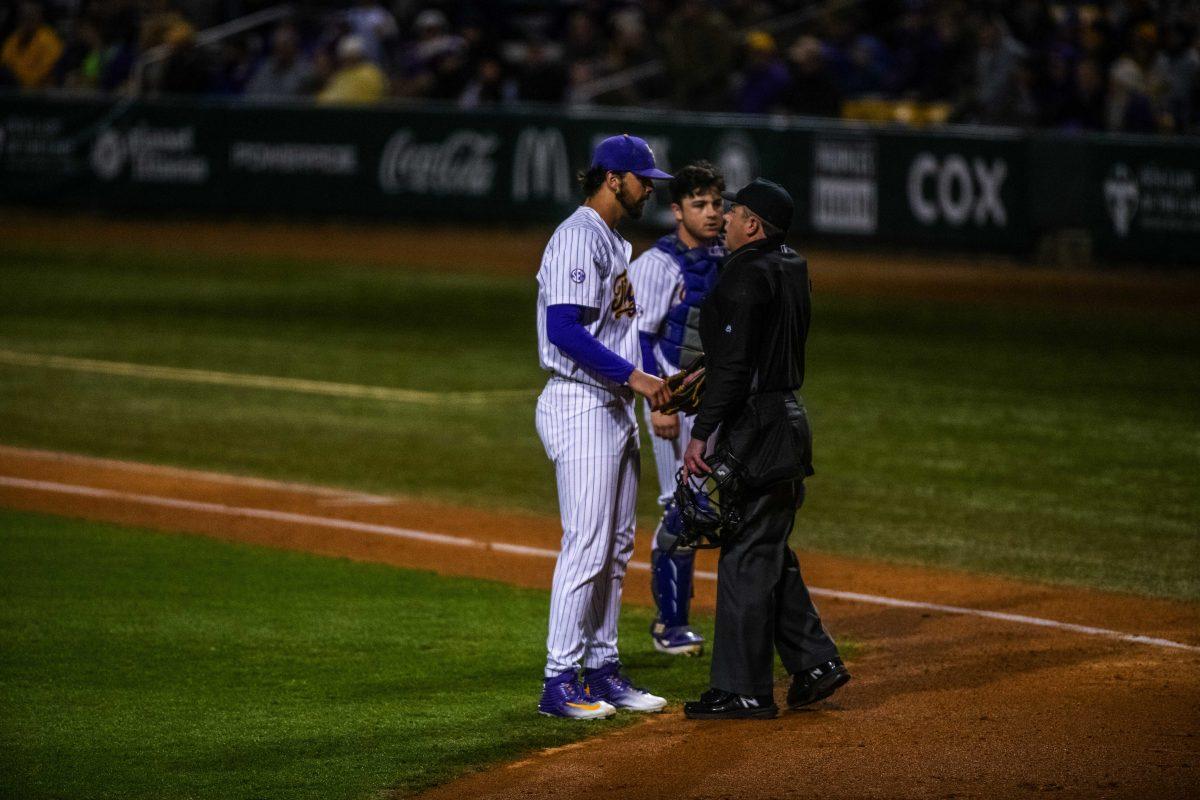 LSU baseball sophomore right-handed pitcher Blake Money (44) talks to the home plate umpire Friday, Feb. 18, 2022 during LSU's 13-1 win against Maine at Alex Box Stadium on Gourrier Avenue in Baton Rouge, La.