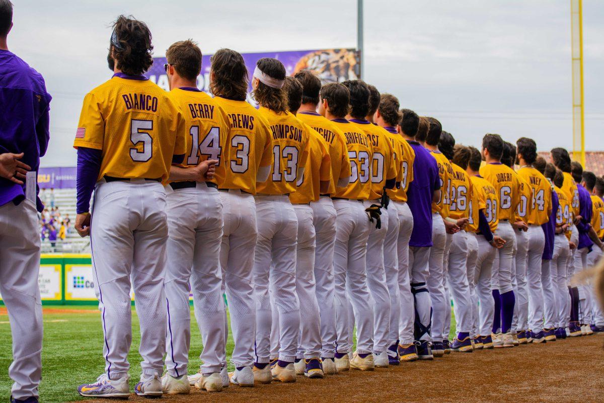 The LSU baseball team stands for the national anthem Sunday, Feb. 20, 2022 before LSU's 21-6 win against Maine at Alex Box Stadium on Gourrier Avenue in Baton Rouge, La.