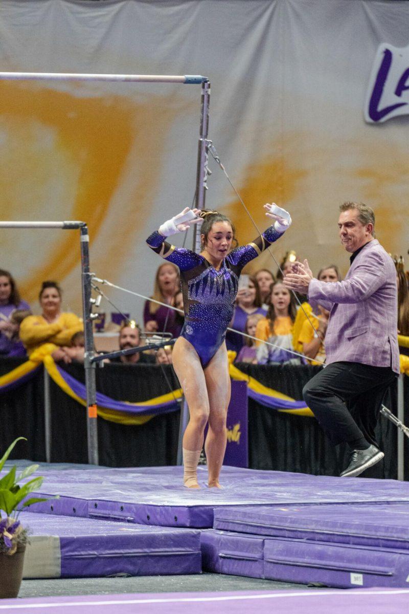 LSU gymnastics all-around sophomore Elena Arenas sticks the landing on Friday, March 4, 2022, during LSU gymnastics&#8217; 107.500-197.450 loss against Kentucky in the Pete Maravich Assembly Center on North Stadium Drive in Baton Rouge, La.