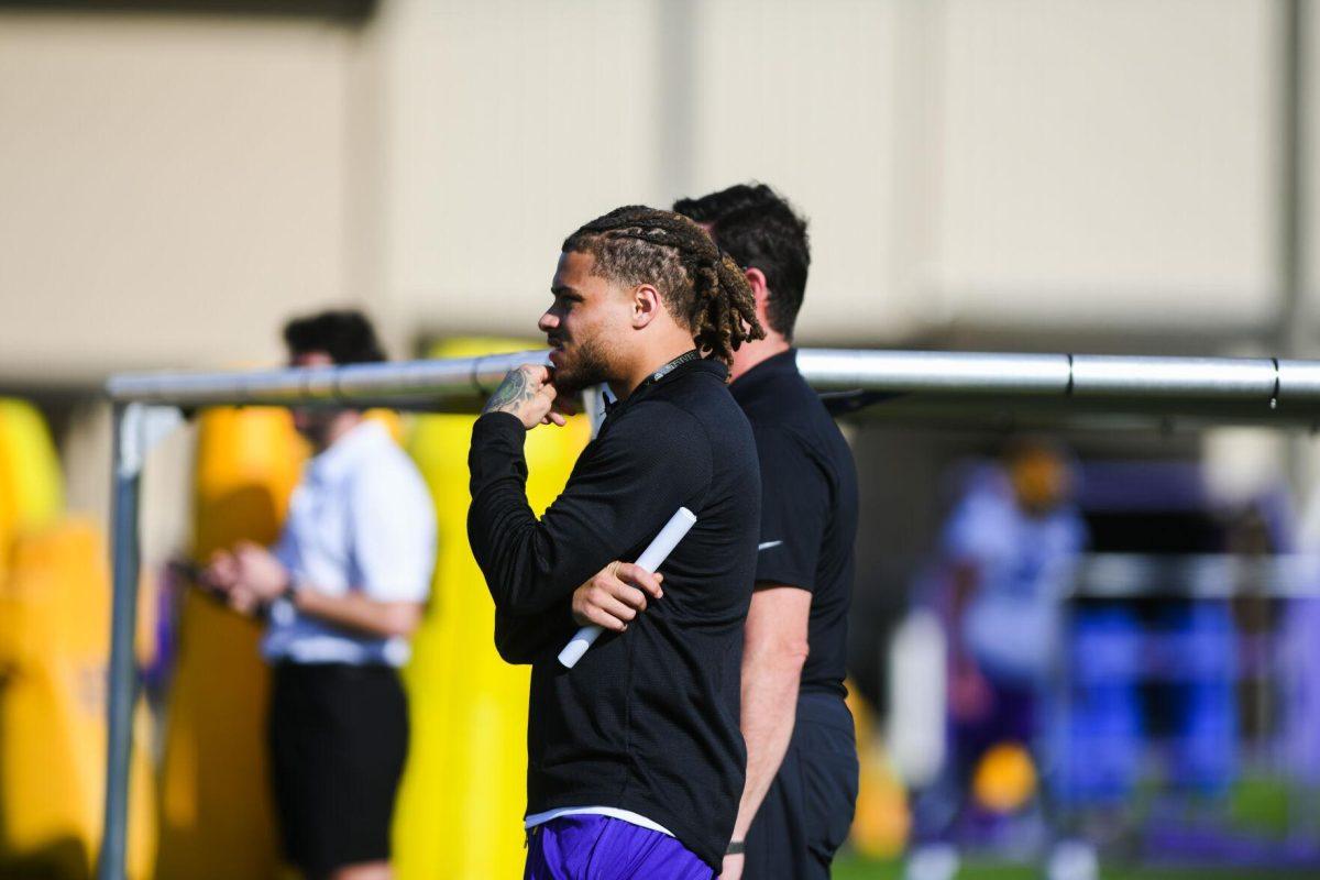 Former LSU football safety and Super Bowl Champion Tyrann Mathieu watches practice Tuesday, March 29, 2022 during LSU's spring practice in Baton Rouge, La.