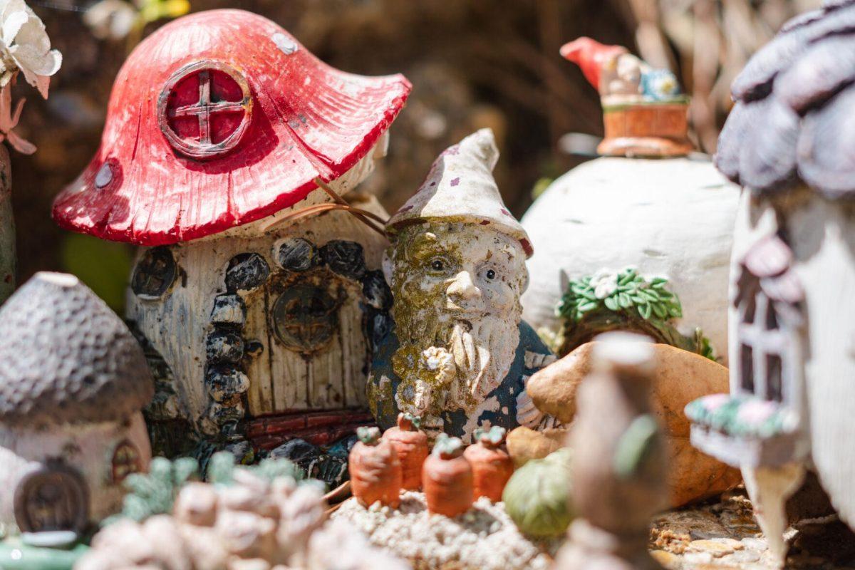 The Wizard grows carrots in front of its mushroom abode on Thursday, March 24, 2022, in the Fairy Garden on LSU&#8217;s campus in Baton Rouge, La.