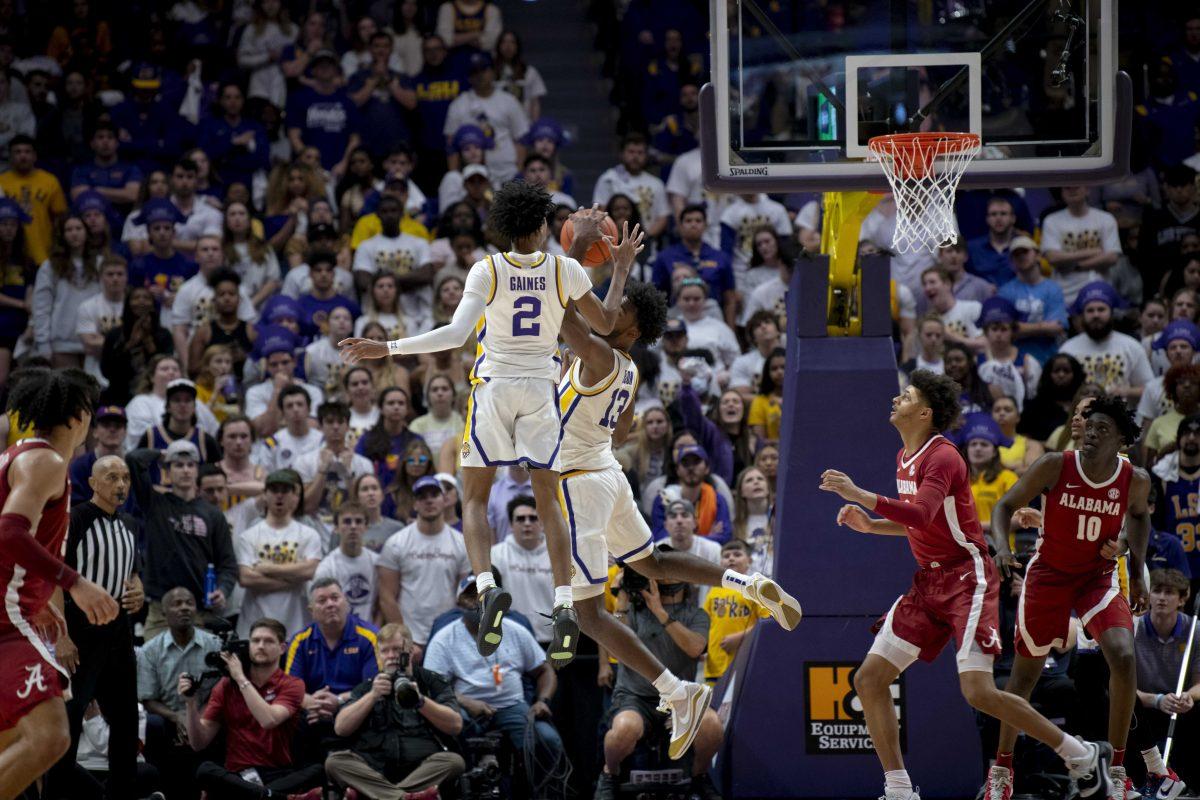 LSU men&#8217;s basketball sophomore forward Tari Eason (13) and sophomore guard Eric Gaines (2) go to catch the ball Saturday, March 5, 2022, during LSU&#8217;s 80-77 win against Alabama in the Pete Maravich Assembly Center on North Stadium Drive in Baton Rouge, La.