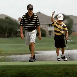 A young Hayden White fist pumps at a Junior Golf Tournament, after sinking a lengthy putt.&#160;