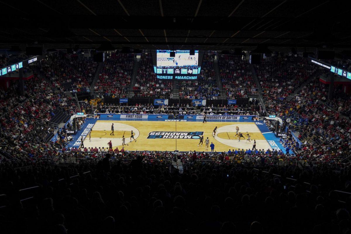 Fans watch the second half of a First Four game in the NCAA men's college basketball tournament between Texas A&amp;M-Corpus Christi and Texas Southern, Tuesday, March 15, 2022, in Dayton, Ohio. (AP Photo/Jeff Dean)