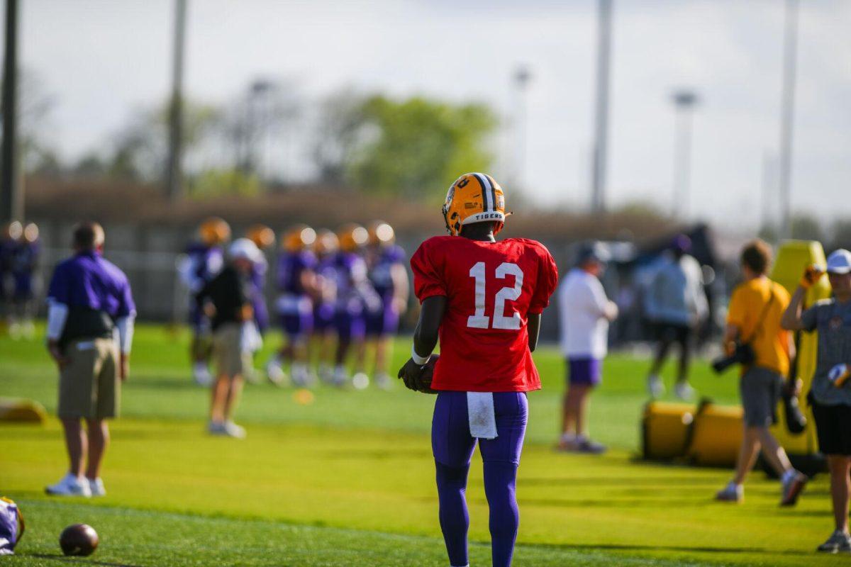 LSU football quarterback redshirt freshman Tavion Faulk (12) works on a drill Tuesday, March 29, 2022 during LSU's spring practice in Baton Rouge, La.