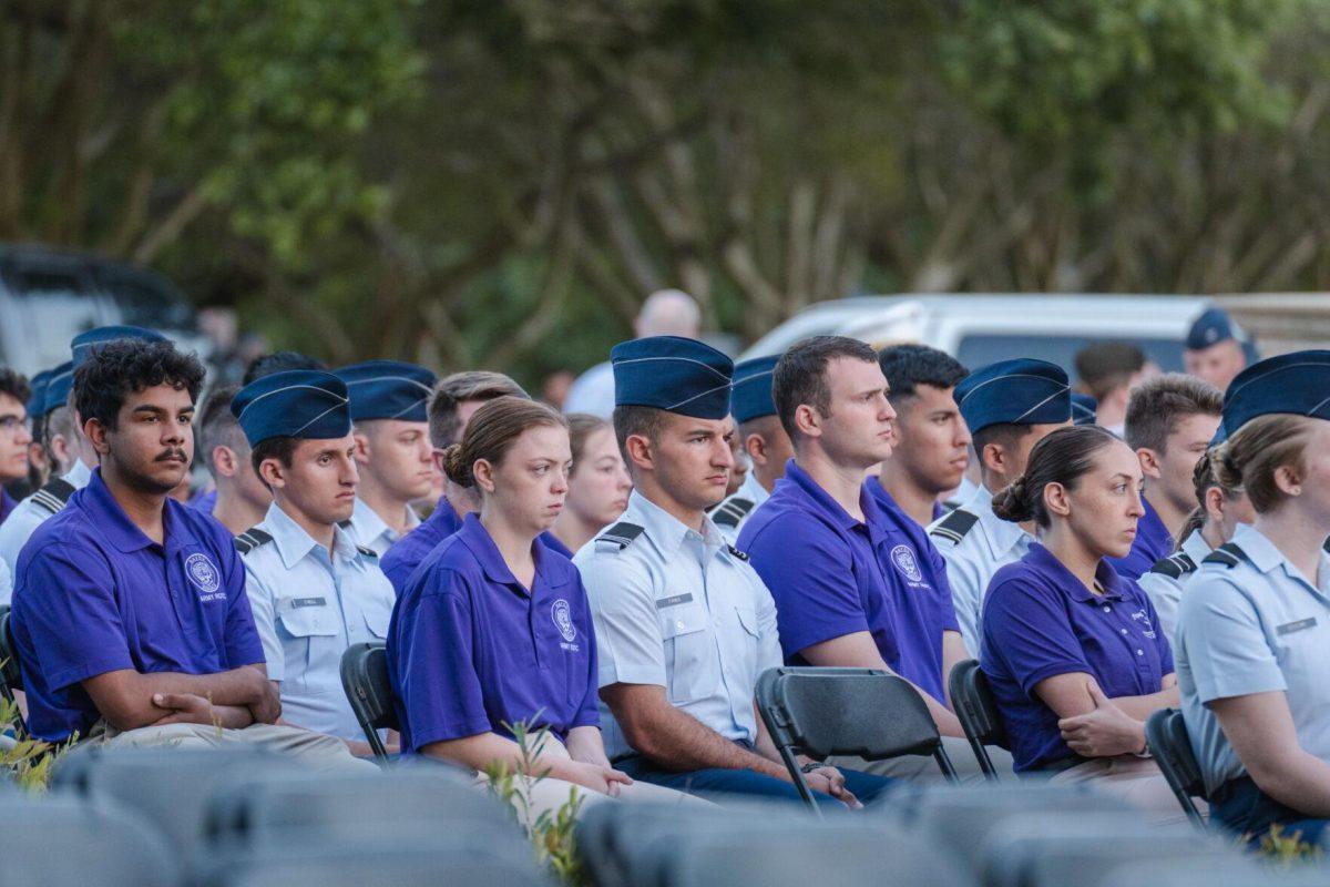 Members of the LSU ROTC watch the event on Thursday, April 7, 2022, during the LSU Memorial Tower Museum ceremony on Tower Drive in Baton Rouge, La.