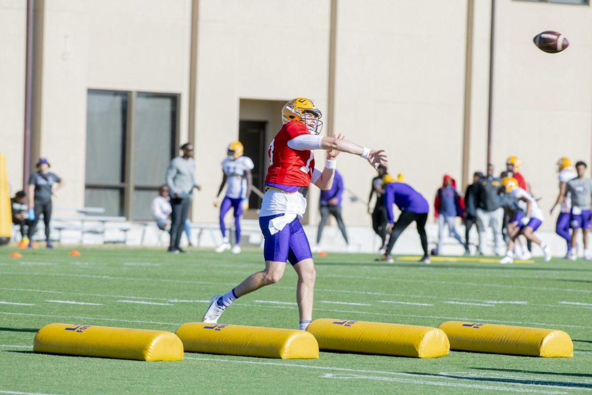 LSU football quarterback Garrett Nussmeier (13) passes the ball Thursday, April 7, 2022, during LSU&#8217;s spring practice in Baton Rouge, Louisiana.