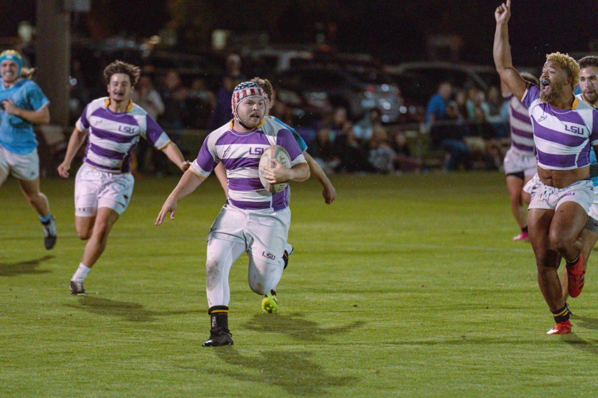 LSU Rugby hooker John Salyer easily reaches the end zone on Friday, April 8, 2022, during LSU&#8217;s 89-0 win over Tulane at the UREC Fields on Gourrier Avenue in Baton Rouge, La.