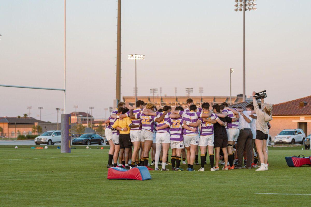 The LSU Rugby team huddles up on Friday, April 8, 2022, prior to their match against Tulane at the UREC Fields on Gourrier Avenue in Baton Rouge, La.