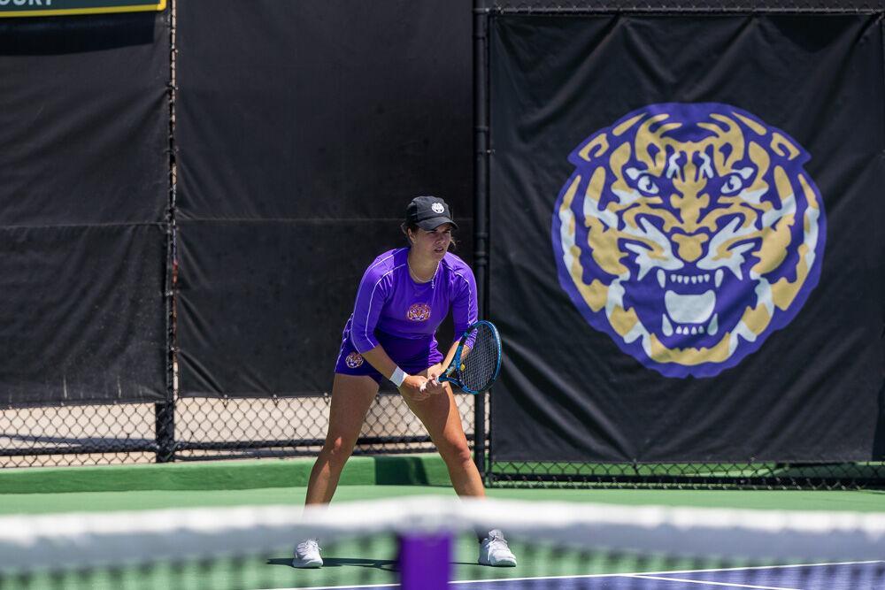 LSU women&#8217;s tennis junior Nina Geissler prepares to return the serve Friday, April 8, 2022, during LSU&#8217;s 7-0 loss against Texas A&amp;M in the LSU Tennis Complex on Gourrier Avenue in Baton Rouge.