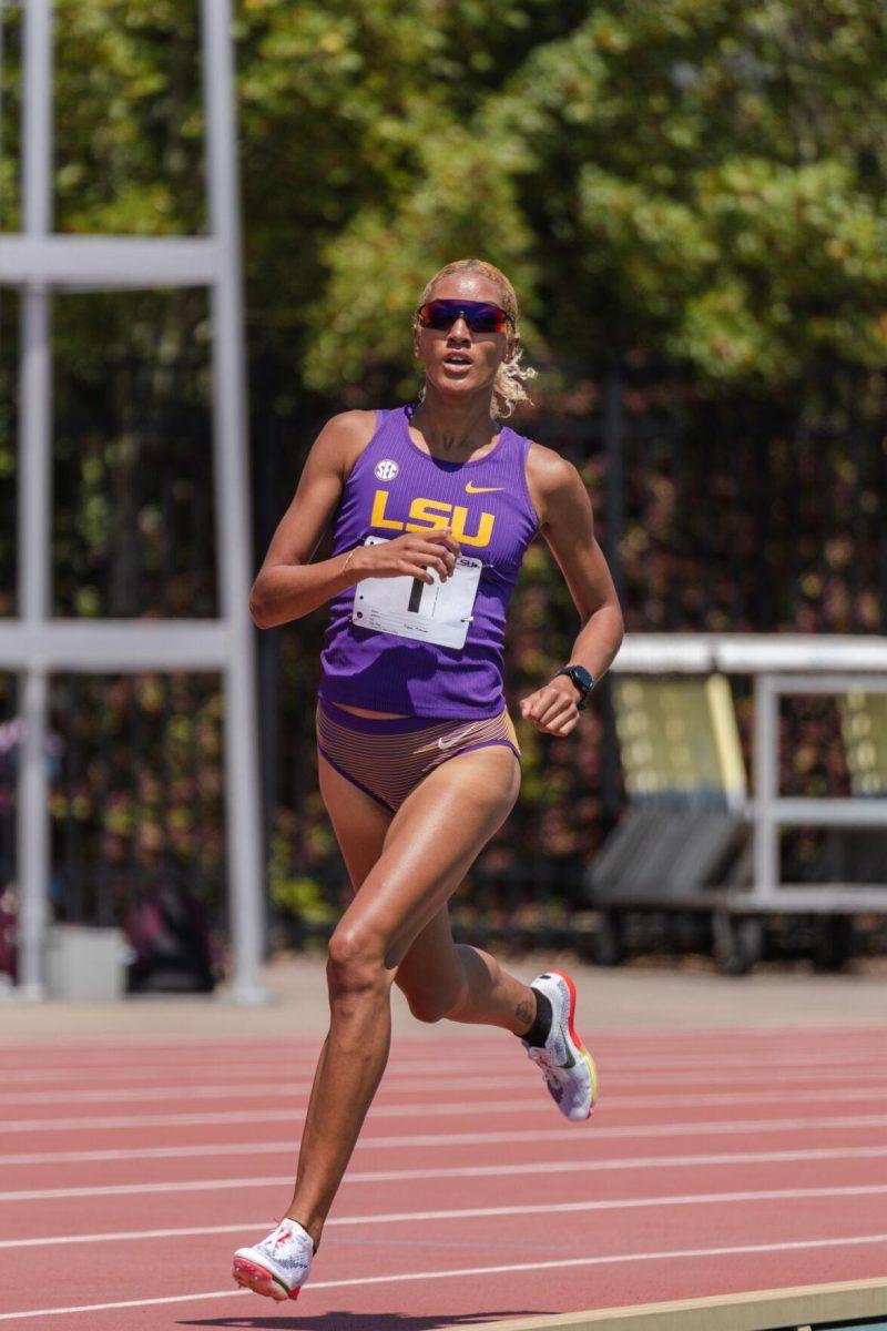 LSU track and field distance junior Katy-Ann McDonald rounds the bend on Saturday, April 2, 2022, during the 1500m run at the Battle on the Bayou track meet at Bernie Moore Stadium in Baton Rouge, La.