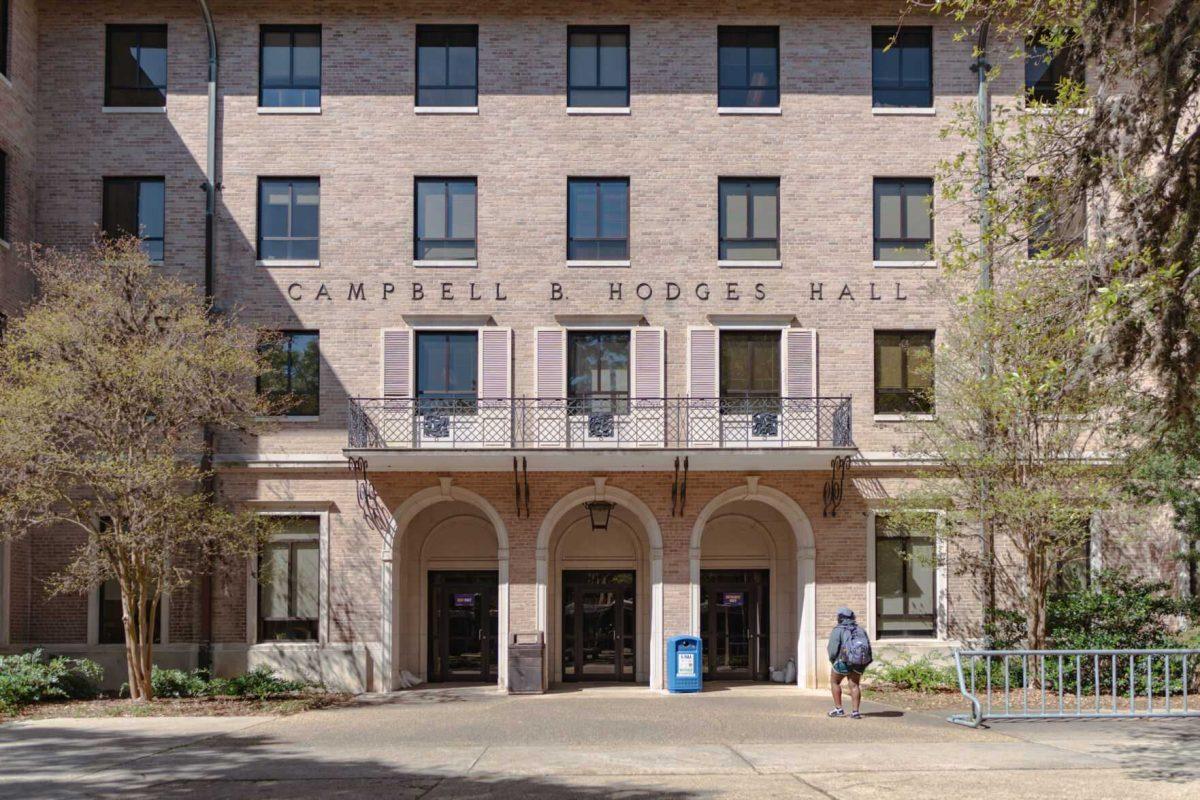 A student walks into Hodges Hall on Friday, April 1, 2022, on Field House Drive in Baton Rouge, La.