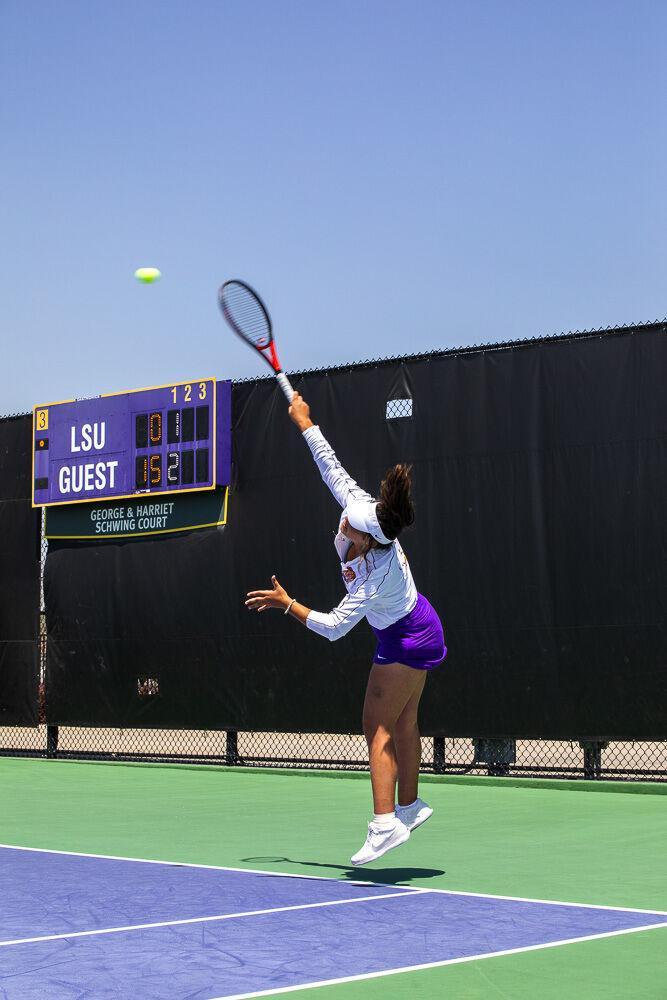 LSU women&#8217;s tennis freshman Rania Azziz serves the ball Friday, April 8, 2022, during LSU&#8217;s 7-0 loss against Texas A&amp;M in the LSU Tennis Complex on Gourrier Avenue in Baton Rouge.