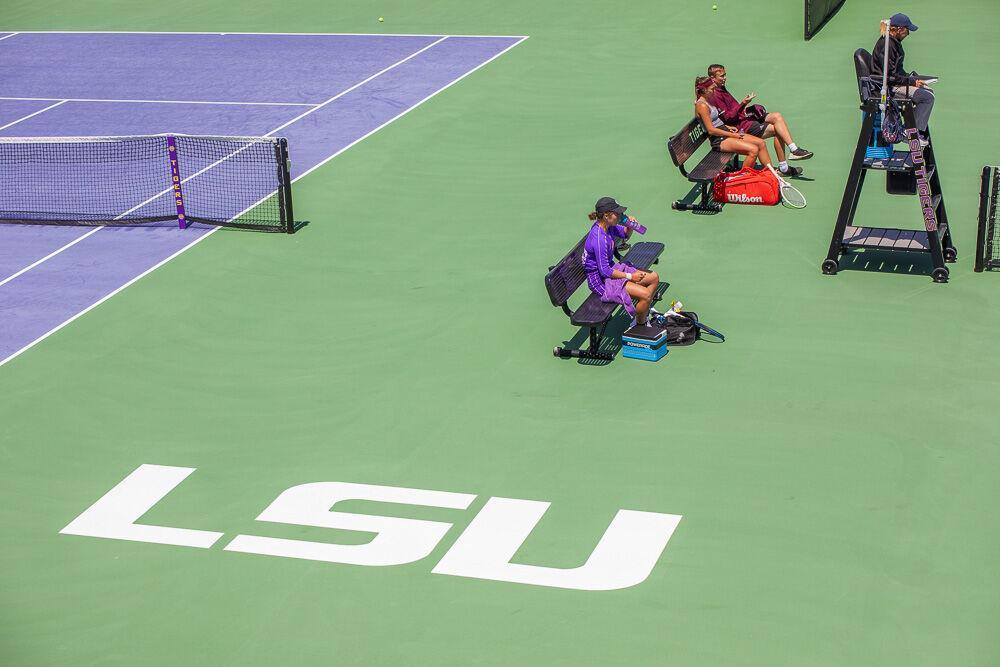 LSU women&#8217;s tennis junior Nina Geissler rests on the bench before the next serve Friday, April 8, 2022, during LSU&#8217;s 7-0 loss against Texas A&amp;M in the LSU Tennis Complex on Gourrier Avenue in Baton Rouge.