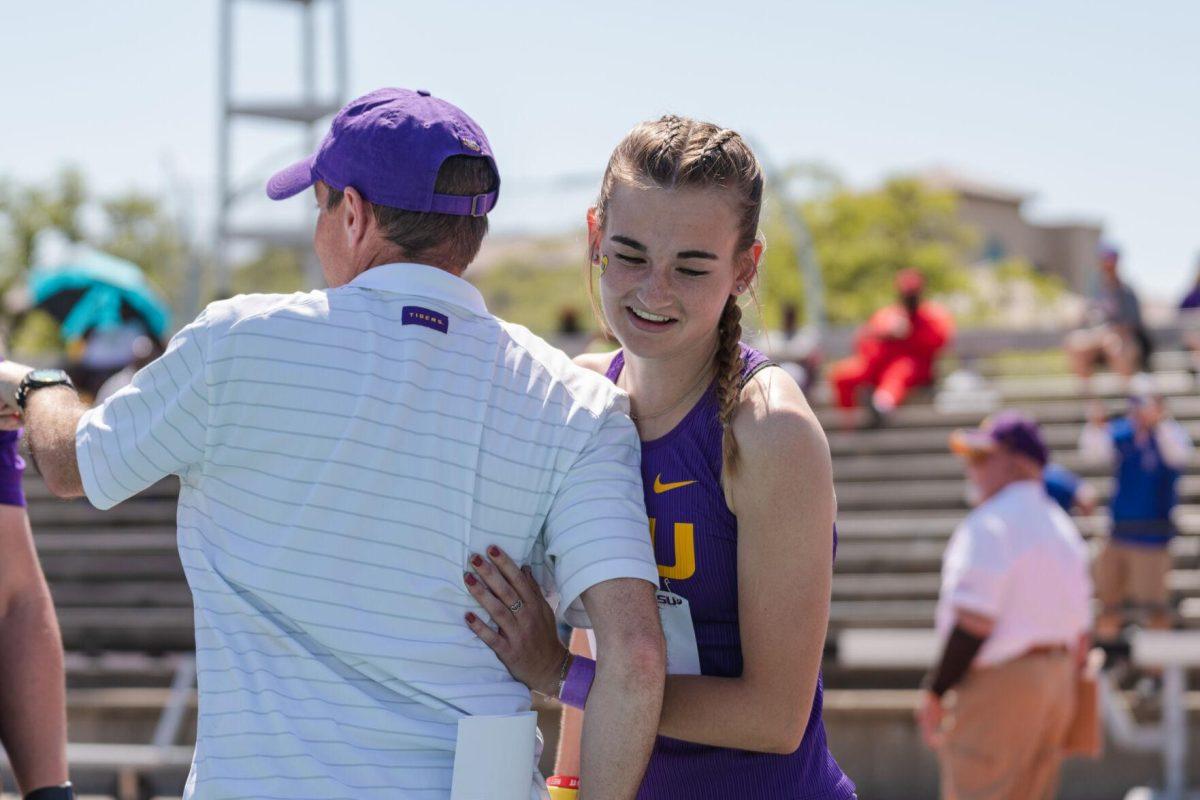 LSU track and field sophomore Hannah Carroll hugs her coach on Saturday, April 2, 2022, after the 800m run at the Battle on the Bayou track meet at Bernie Moore Stadium in Baton Rouge, La.