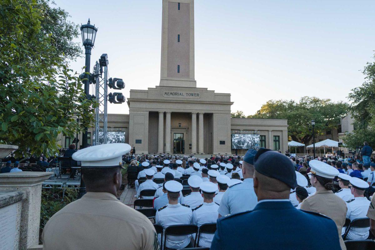 Guests fill the space in front of Memorial Tower on Thursday, April 7, 2022, during the LSU Memorial Tower Museum ceremony on Tower Drive in Baton Rouge, La.