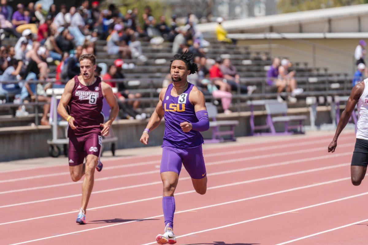 LSU track and field sprints freshman Aaron Smith approaches the finish line on Saturday, April 2, 2022, during the 400m dash at the Battle on the Bayou track meet at Bernie Moore Stadium in Baton Rouge, La.